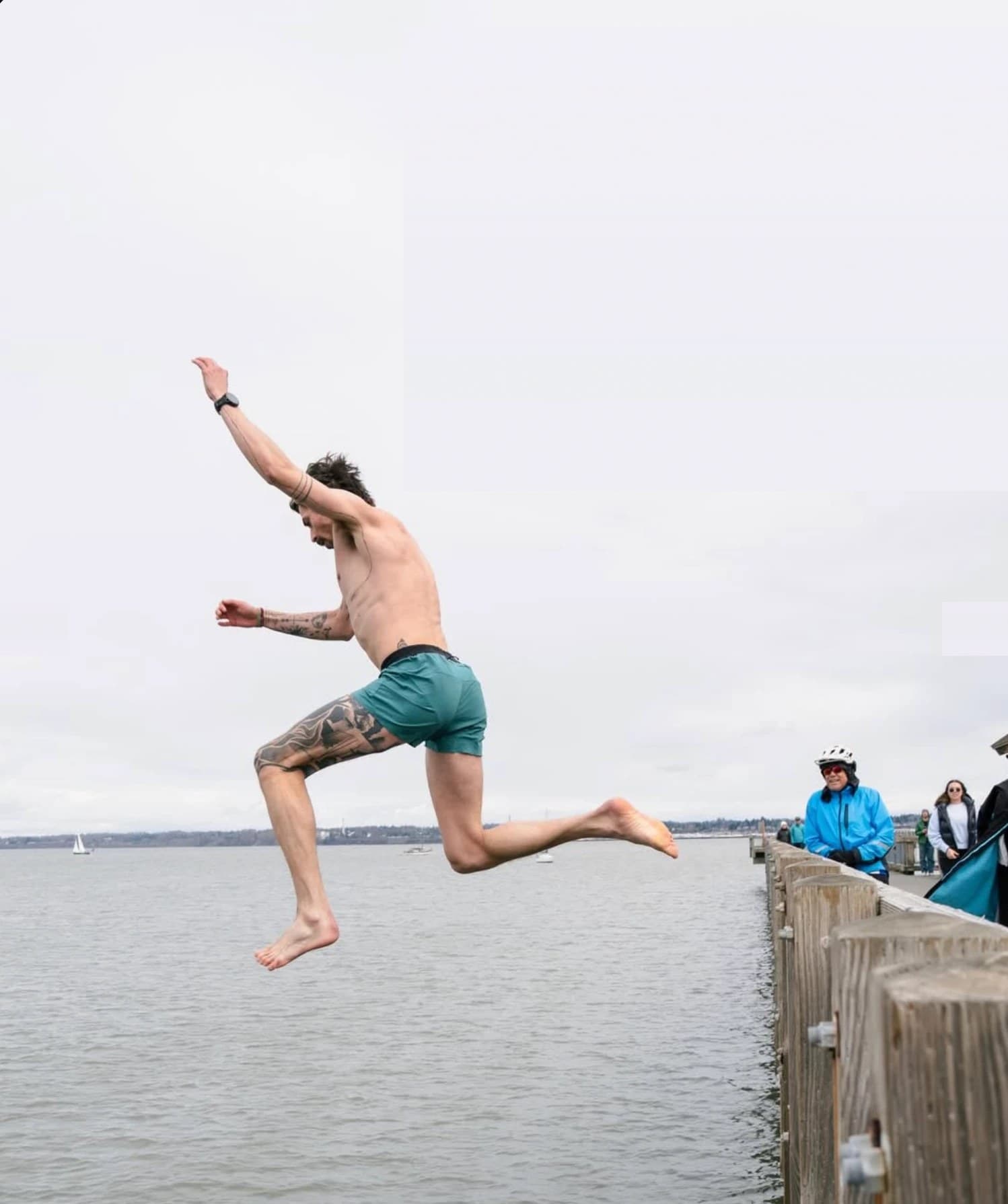 Matt Welch mid-leap off the dock